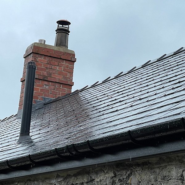 Slate roof with new chimney